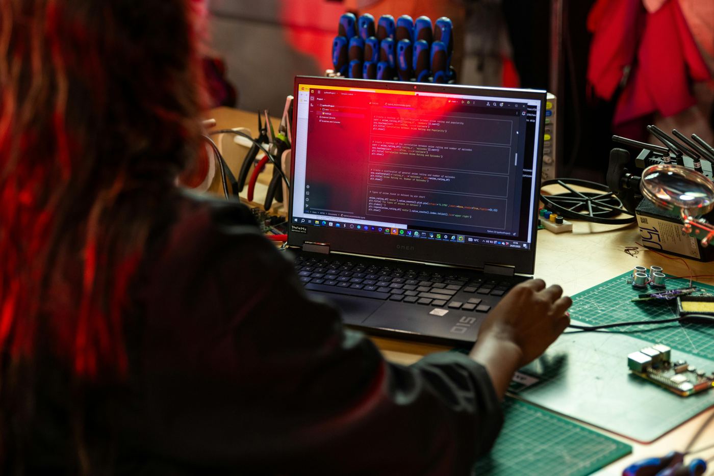 Engineer working at a laptop in a lab